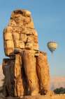Africa, Egypt, Luxor. Hot air balloons travel over the Valley of the Kings at sunrise. Art Print